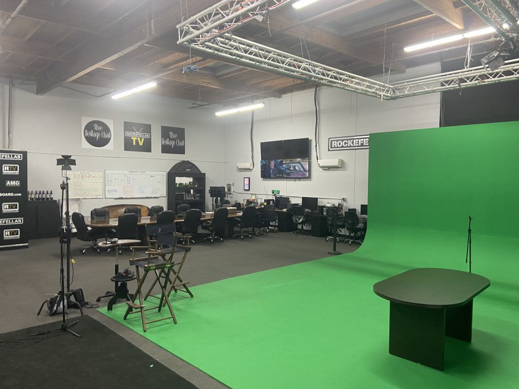 Full-production studio floor with green screen, lighting rig & multi-seat audience setup β Corona, CA